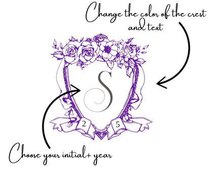 Decorative crest with floral elements and customizable text on a white background